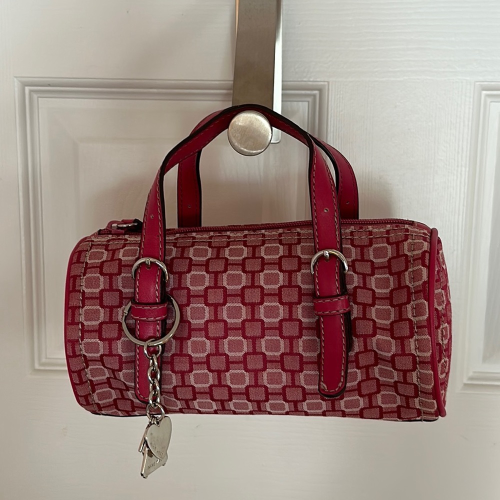 Magenta cylinder Nine West mini purse with purse charm